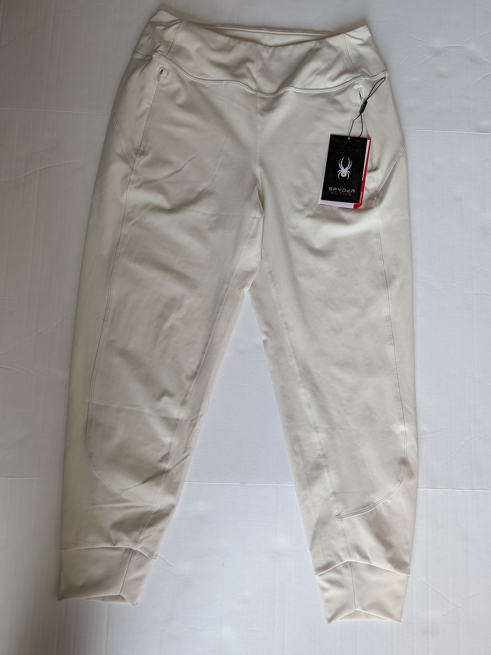 Spyder Women’s Jogger Pants L NWT Ivory Cream Ski Athletic Stretch Zip Pocket